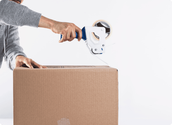 sealing_cardboard_shipping_box_with_packaging_tape